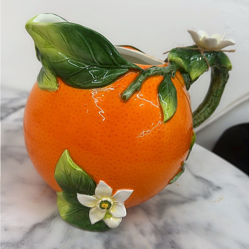 Orange Ceramic Pitcher with Leaf & Flower Detail